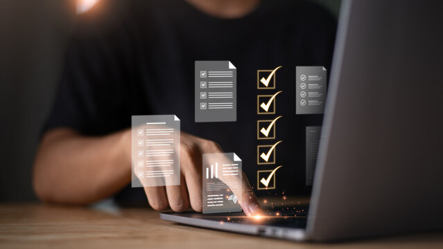 Accountant showing office document auditing concept ,plan review process and assess correctness ,Management of important document storage of organization ,document system ,accountant Audit documents