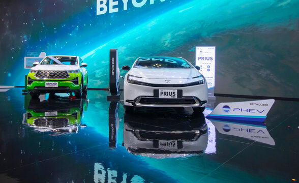 Tangerang, Banten, Indonesia, July 20, 2024. Toyota Prius PHEV and Toyota Innova Zenix HEV Flexy Fuel Concept vehicles showcased at the 2024 Gaikindo Indonesia International Auto Show (GIIAS) event.