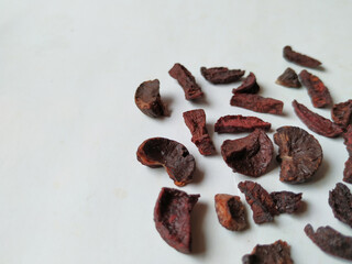 Adike or Areca Slices texture and pattern isolated on white background.