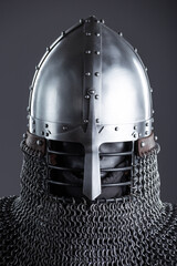 Simple Medieval Knight's Nasal Helmet with Chainmail. Classic head protection featuring a central...