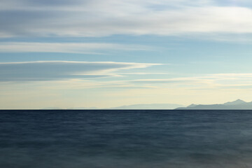 Aegean Sea. Quiet waves in the bay. A clear horizon