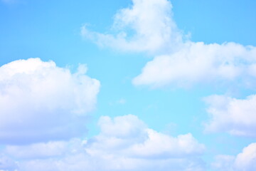 White clouds in a blue bright sky.