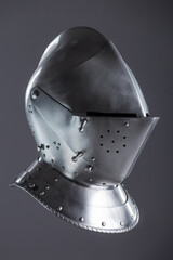 Shiny Silver Medieval Armet Helmet with Visor. This polished silver armet features a hinged visor...