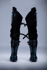 Shiny Steel Medieval Leg Armor. Full leg protection with straps and buckles detail.