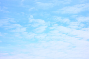 White clouds in a blue bright sky.