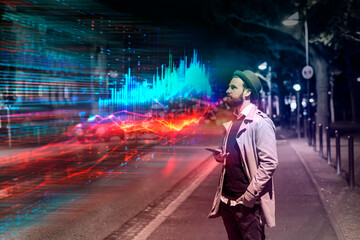 Young man using smartphone with augmented reality data visualization on city street at night