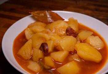 A closeup of a plate of potato traditional spanish style (riojana)