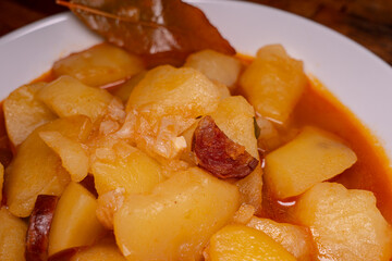 Close-up of potato traditional recipe. Spanish riojana style potatoes cook
