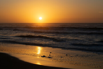 Golden Sunset over the Ocean Waves