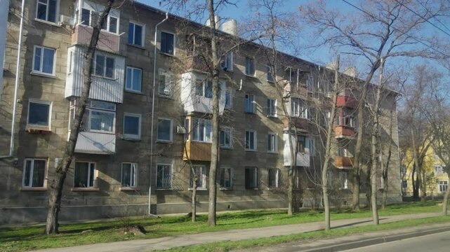 view from car window on city streets of Tiraspol, buildings and architecture, Transnistria, Moldova
