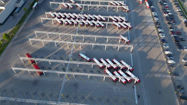 TTC public transit electric buses charging at transportation depot in urban city