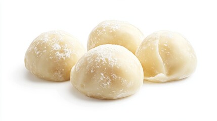 Three Fresh Frozen Dumplings with Soft Frosted Texture on Pure White Background