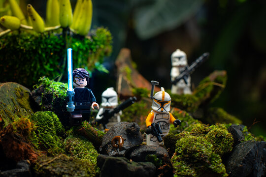 Depok, Indonesia - April 1, 2025: Lego toys photography, Anakin Skywalker leads 1st phase clone troopers in dark forest covered with moss, with bokeh background
