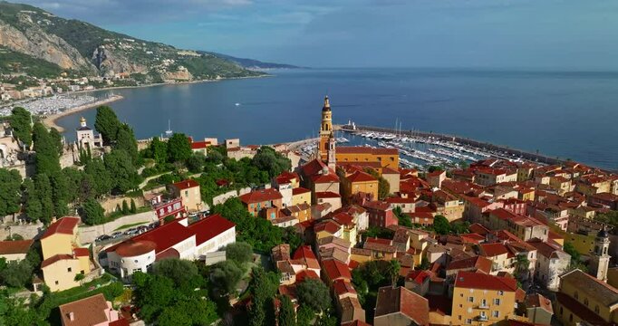Establishing drone shot on old part of Menton, Provence. Tourist attraction, travel guide and sights of city breaks. Travelling, landmarks. Menton is a famous holiday destination in France