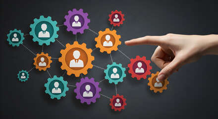 Human Resources Network Connecting People Gears with Colorful Cogwheels and a Hand on a Dark Gray Background