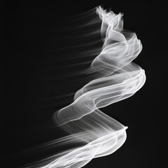 A black and white photo of a white ribbon with a black background