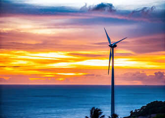 wind turbines at sunset