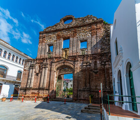 A view towards the front of the ruins of the Convent of Santo Domingo in old Panama City in the early morning in springtime