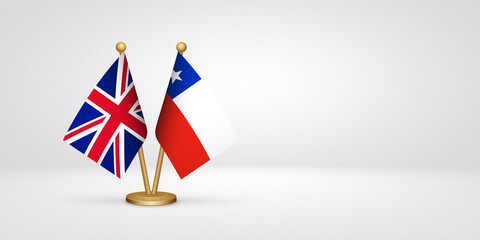 UK vs Chile desk flags mockup 3d illustration. Versus flag of United Kingdom of Great Britain
