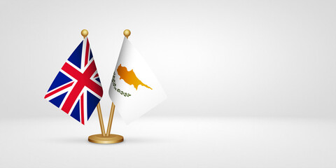 UK vs Cyprus desk flags mockup 3d illustration. Versus flag of United Kingdom of Great Britain