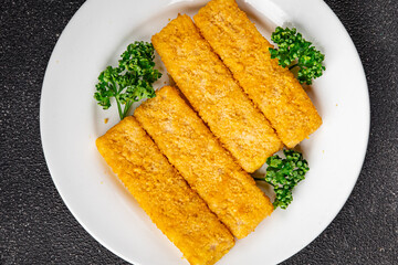 Fish sticks seafood dish fresh gourmet food background on table rustic food top view copy space keto and paleo pescetarian diet