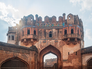 Backlight view of amazing fort at Bidar, ancient stone wall gateway famous unesco travel destination, Karnataka, India