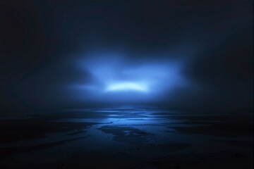 Mysterious blue light illuminating a dark abstract landscape background.