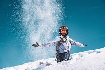 Photo of happy woman on top of Groste hill in Madonna Di Campiglio