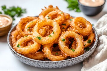 Crispy onion rings on a plate