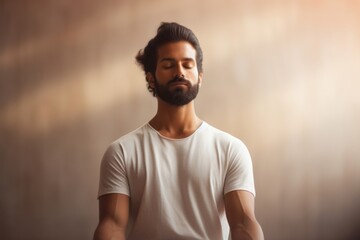 Obraz premium Indian guy does yoga beard adult contemplation.