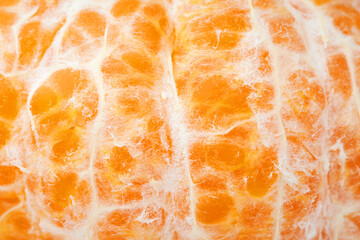 Close up Macro Shot of Orange Fruit Texture Showcasing Vibrant Peel and Pith Details on White and Isolated Background