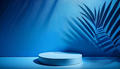 Abstract blue background with shadow of palm leaves for the presentation of a cosmetic product. A scene with a geometric backdrop. Podium for product promotion, beauty, natural eco cosmetic. Showcase.