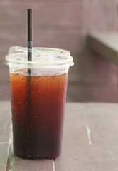 glass of cola with ice