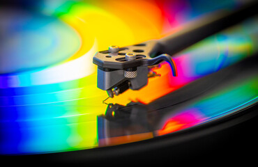 vinyl record with colorful lights reflection