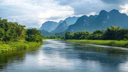 A scenic river flowing through mountains with lush green vegetation