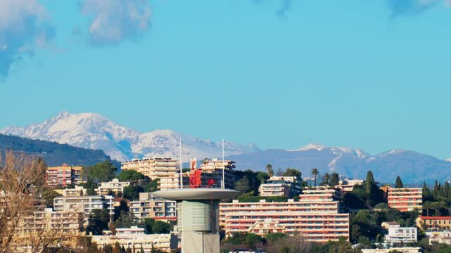 View of the radar antenna at Nice airport, France, mountains in the background