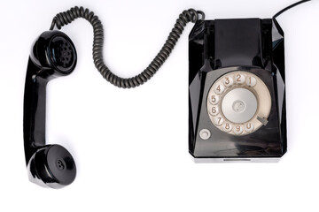 Vintage dial telephone. Isolated olive green telephone on gray background. Old fashioned...