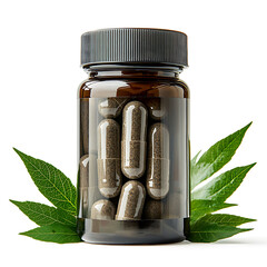 Brown bottle filled with dark capsules surrounded by vibrant green leaves isolated against a clean white background.