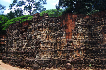 Naklejka premium Sculpture carving story khmer Empire on wall in Prasat Ta Prohm or Ancestor Brahma temple of Angkor Thom Wat for cambodian people foreign travelers travel visit at Siemreap city in Siem Reap, Cambodia