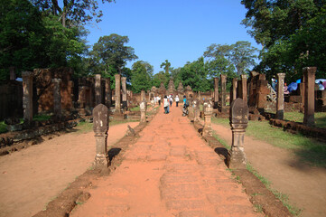 Naklejka premium Sculpture carving ancient ruins antique building Prasat Banteay Srei or Banteay Srey temple of Angkor Wat for Cambodian people travelers travel visit respect pray at Angkor Thom in Siem Reap, Cambodia