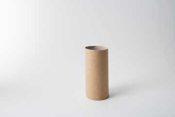 Empty cardboard tube for crafting or recycling ideas, ideal for eco-conscious businesses, education, or creative industries focusing on DIY, sustainable art, and innovative design,