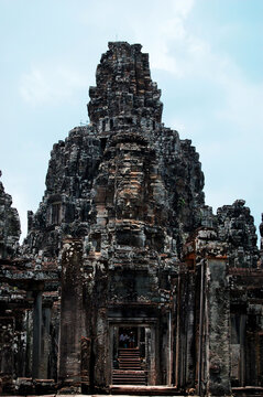 Sculpture carving ancient ruins antique building of Prasat Bayon Castle or Jayagiri Brahma Temple for Cambodian people and travelers travel visit respect pray at Angkor Thom Wat in Siem Reap, Cambodia