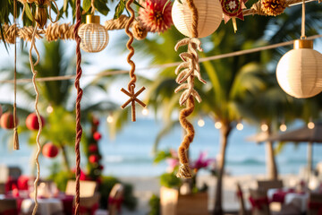 Festive outdoor beach event decoration featuring hanging paper lanterns and decorative ornaments.  Warm, inviting setting with a beautiful ocean backdrop.