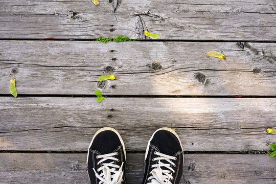 old wooden floor and sneakers