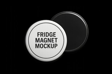 Two round fridge magnets, one front facing with white surface, other blurred in background