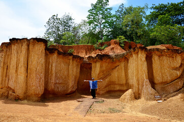 Thai woman portrait and happy feeling at Phae Mueang Phi