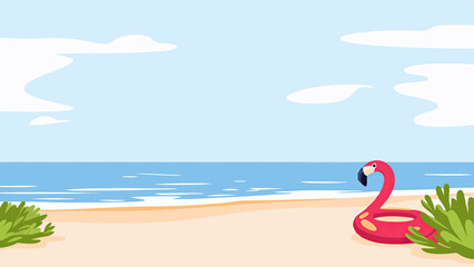 Pink flamingo float on beach with ocean background  