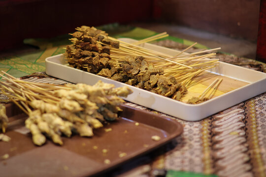 Uncooked Sate Padang. Spicy beef satay from Padang, West Sumatra, preparation for cooking Padang satay.