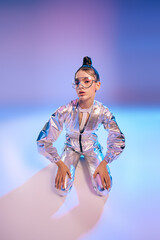 Futuristic style shines bright with a young womans holographic fashion