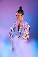 Futuristic fashionista showcases holographic colors in a vibrant modern urban environment